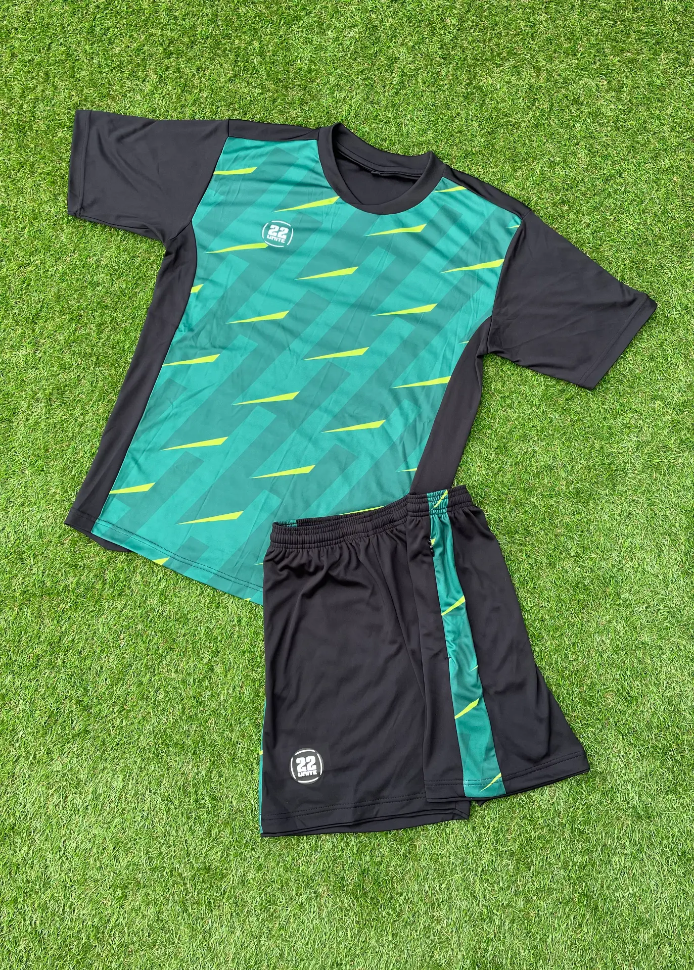 Green and black patterned 22 Unite shirt and shorts