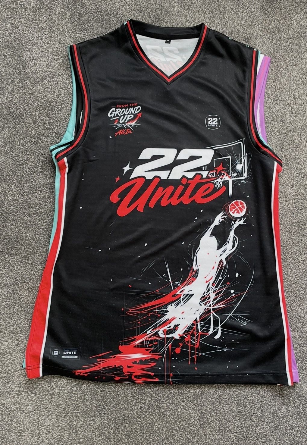 Black, red and white 22 Unite basketball vest from the Ground Up collection